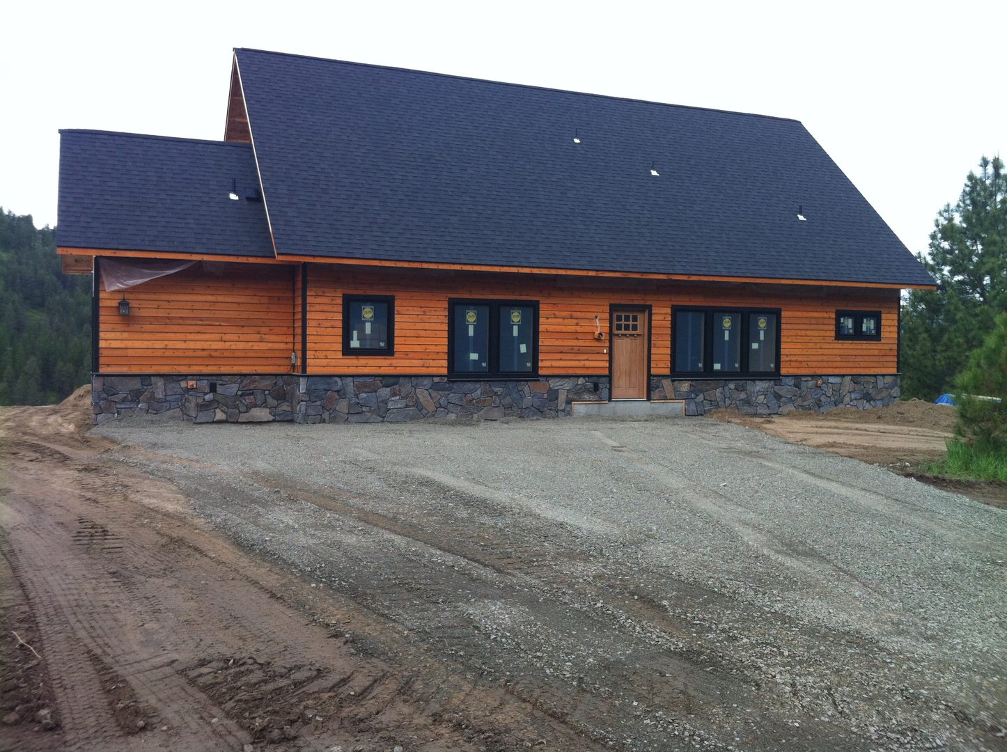 Modern cabin with large driveway