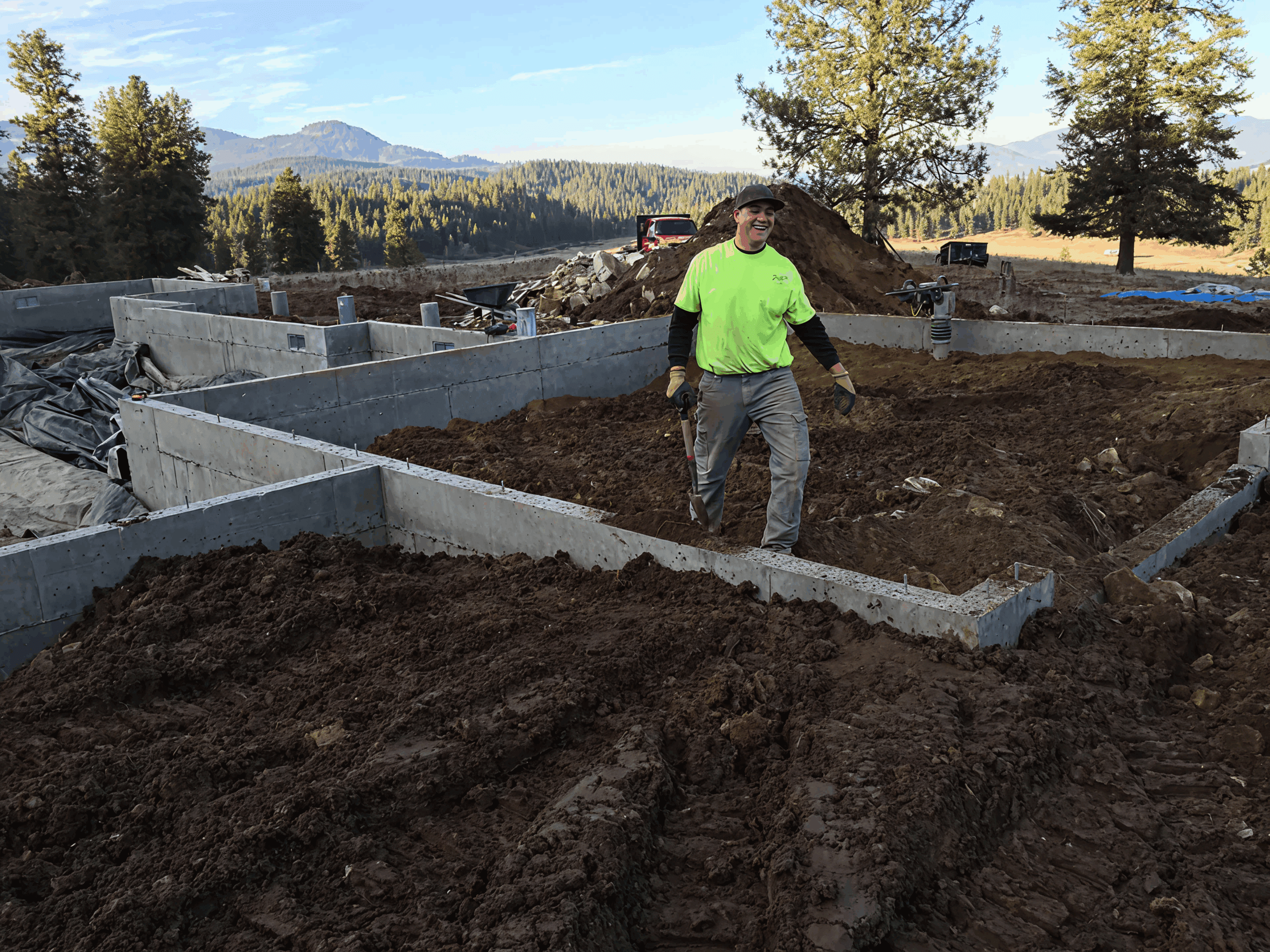 Construction worker at building site foundation