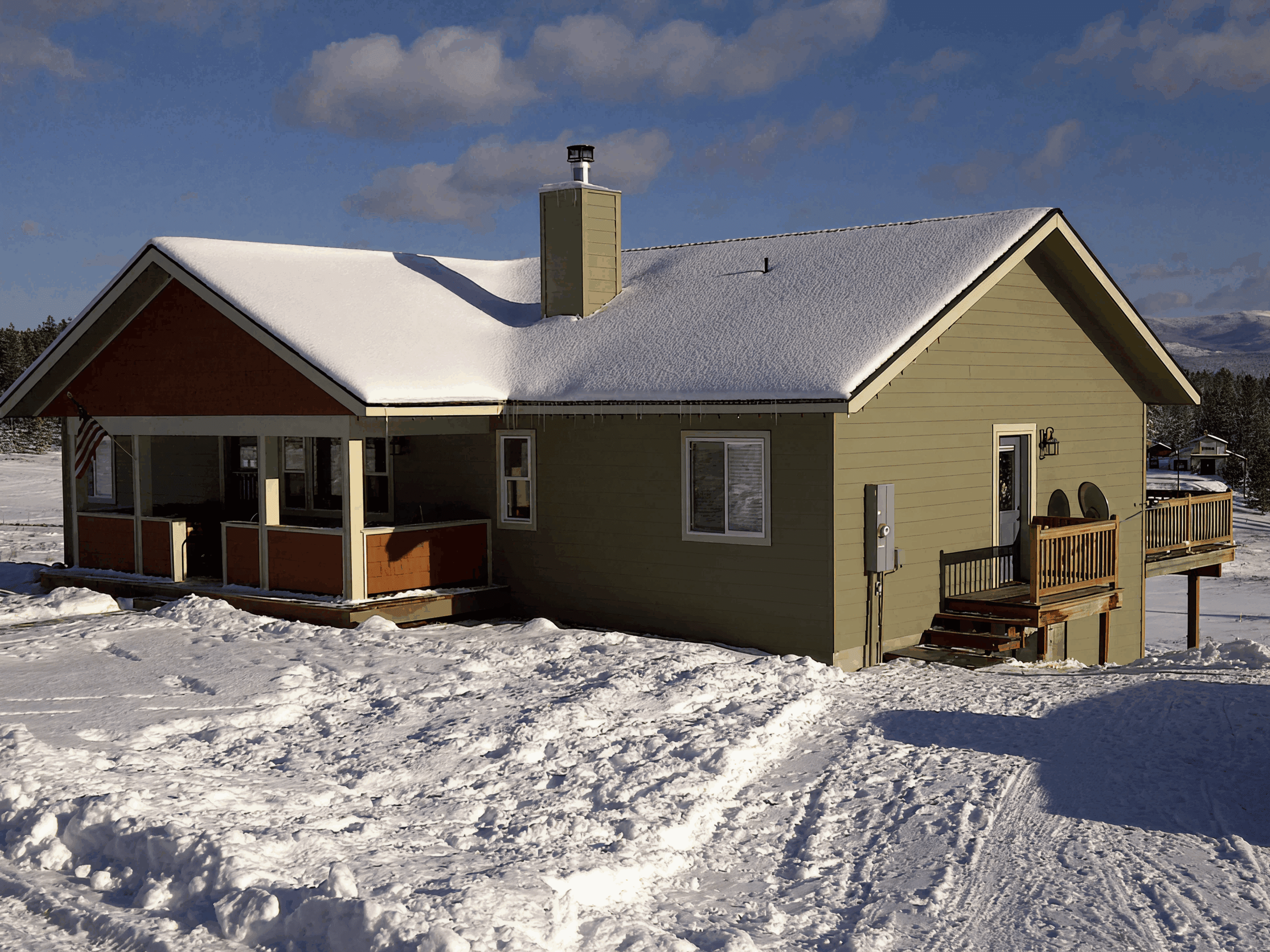 Winter cabin in snowy landscape