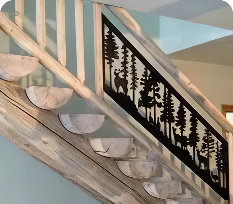 Rustic staircase with wildlife railing design